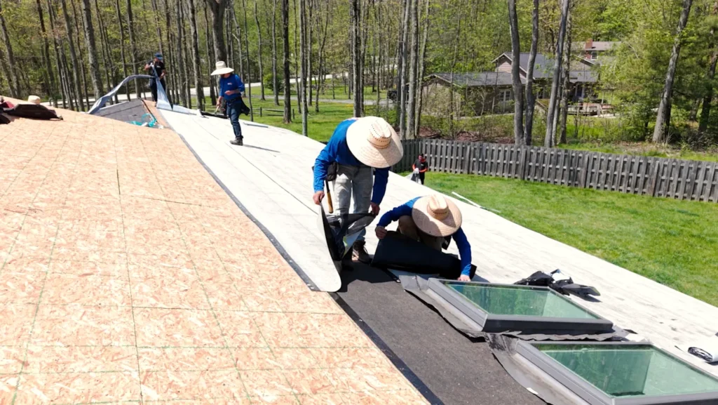 Garfield 1-2323 crew installing roof underlayment on a Northeast Ohio home
